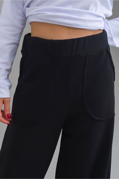 Kadın Siyah Renk Viskon Polyester Likralı Cepli Bol Paça Beli Lastikli Pantolon Siyah - XL